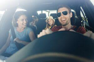 Family in a car with Car insurance in Ball Ridge